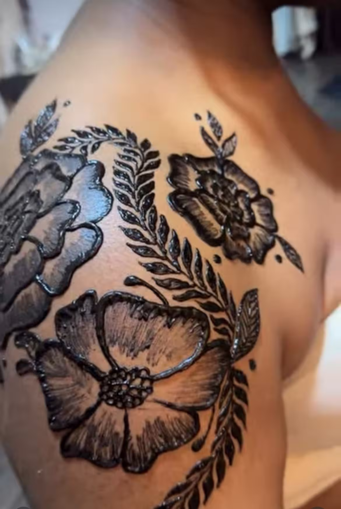A close-up of a second henna design